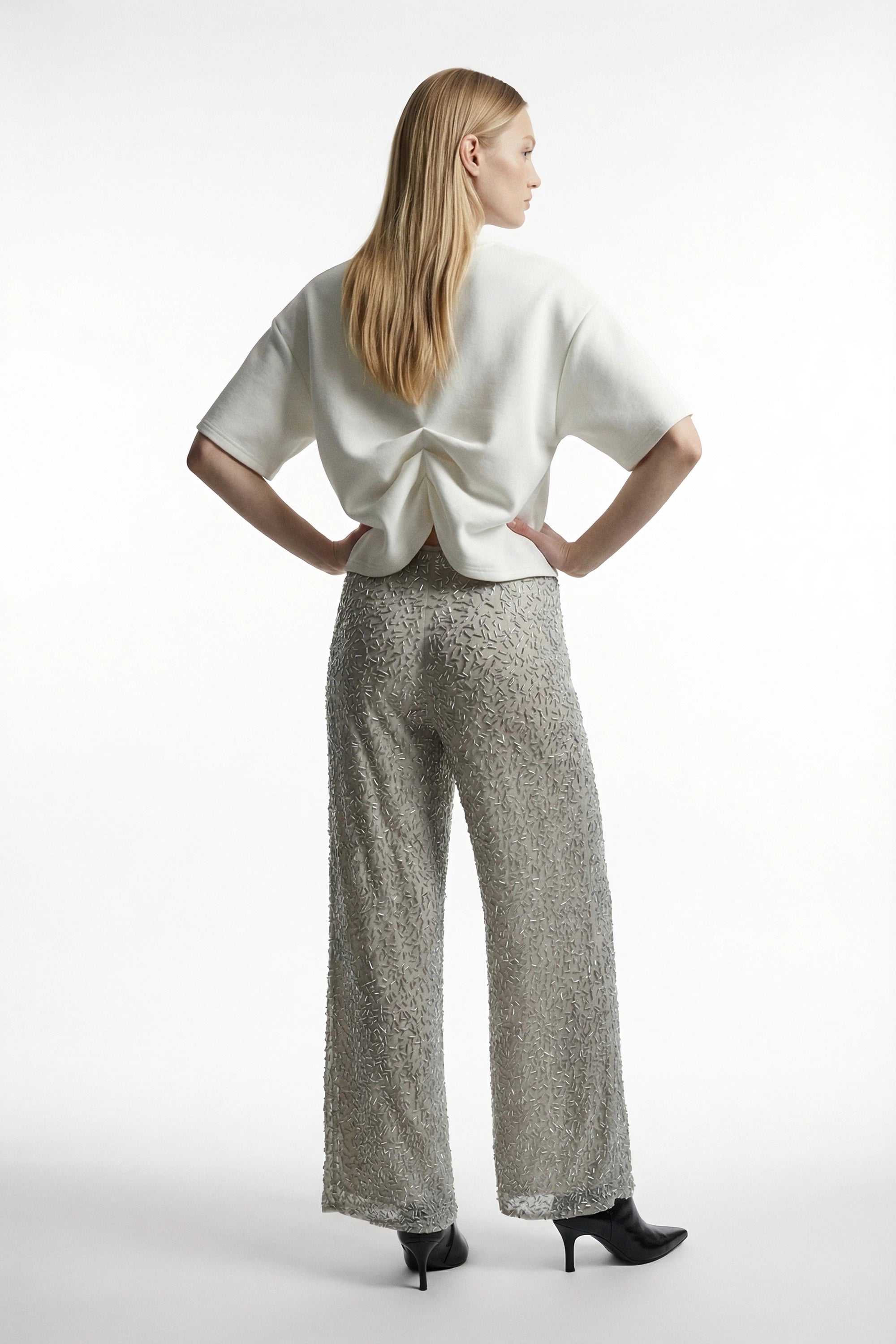 Pantalone semi-trasparente con paillettes