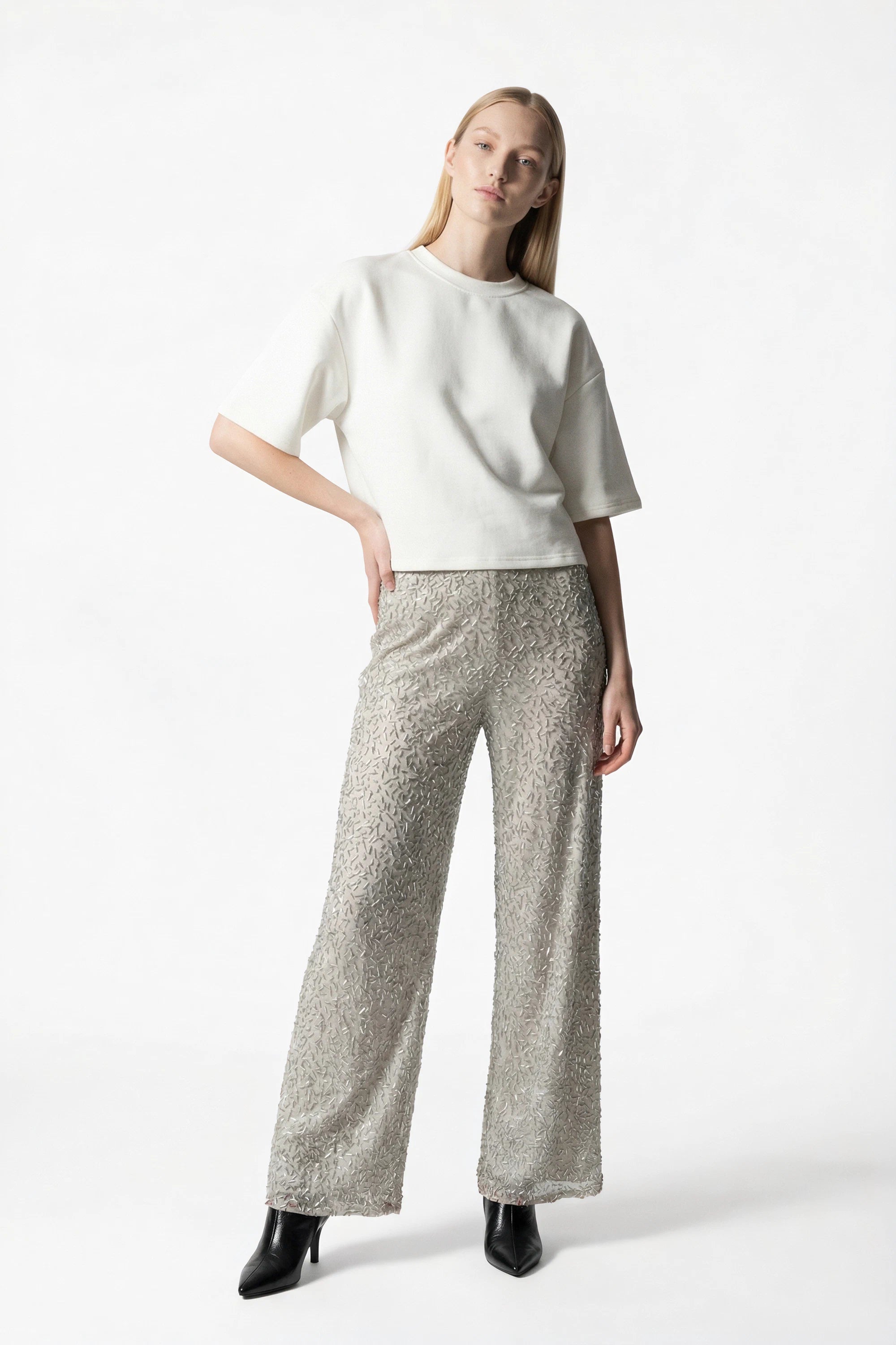 Pantalone semi-trasparente con paillettes